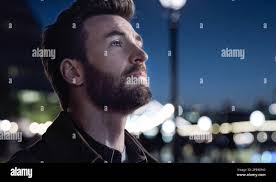 USA. Chris Evans in a scene from the (C)Apple TV+ new film: Ghosted (2023).  Plot: Cole falls head over heels for enigmatic Sadie, but then makes the  shocking discovery that she's a