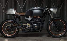 This Evil Beast Of A Custom Motorcycle Honors Hunter S Thompson Triumph Cafe Racer Triumph Thruxton Cafe Racer Bikes
