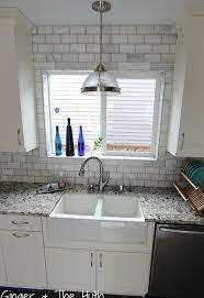 I love how the electrical outlets are hardly even noticeable in the tile! How To Lay Backsplash Around Kitchen Pass Through