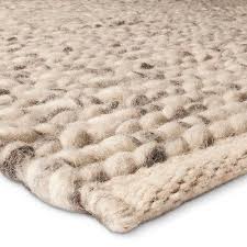 The blanket has been made with giant wood needles. Ivory Chunky Knit Braided Wool Rug 7 X10 Project 62 Braided Wool Rug Wool Rugs Living Room Chunky Braided Wool Rug