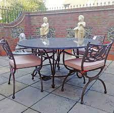 Wooden patio dining tables need a bit of maintenance to stay fresh. Brown Pearl Granite Outdoor Dining Set Clearance From Brights Of Nettlebed