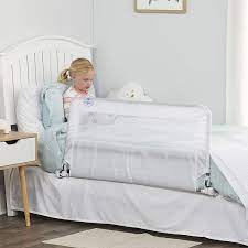 The railing's sturdy steel construction meets all current astm safety standards, so both you and your child can rest easy. Amazon Com Regalo Hideaway Bed Rail Guard With Reinforced Anchor Safety System Childrens Bed Safety Rails Furniture Decor