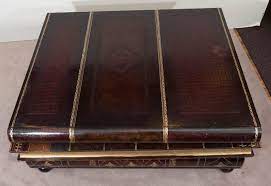 This amount is not visible to anyone but yourself and will only be used as needed to outbid other bidders and win the item at the lowest possible cost to you. Maitland Smith Stacked Books Coffee Table At 1stdibs