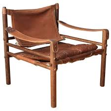 Vintage Leather Safari Chair By Arne Norell 1stdibs Com Safari Chair Metal Dining Chairs Mid Century Leather Chair