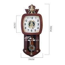 The base of the cross runs right down into the chapter ring edge. Living Room Chinese Wall Clock Large Retro Classical Wooden Antique