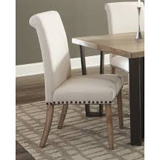 Somehow, this set of chairs is *that* versatile. Dining Chairs With Nailhead Trim Beige And Pine Set Of 2 Overstock 22158310