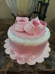This One Tier Diaper Cake Will Make A Beautiful Accent Or Even Work As The Central Centerpiec Girl Baby Shower Decorations Diaper Cakes Girl Baby Shower Crafts