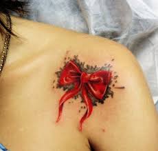 Pink ribbon is typically used to symbolize a breast cancer. 60 Sexy Bow Tattoos Meanings Ideas And Designs For 2021