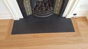 The Single Oak Flooring Border We Fitted Sits Neatly Around This Black Hearth The Honey Tones Of The Oak Pick Stairs Cladding Hearth Tiles Floor Installation