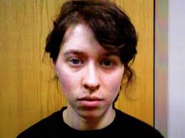 Why was the word "boy" carved into the arm of an accused killer?