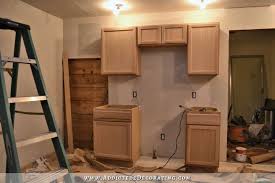 Fridge Wall Progress Converting Wood Cabinet Doors To Glass And Your Faqs Answered Addicted 2 Decorating