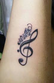 From patriotic emblems to disposable fashion statements, tattoos have long embodied the values of our cultural moments. Music Tattoo Ideas G Clef Small Notes Lyrics Statements Instruments Types Music Tattoos Music Tattoo Designs Small Music Tattoos