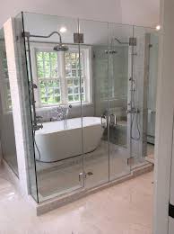 Double Overhead Shower Heads Glass Shower With Stone Work Over The Piping Path Creative Design Overhead Shower Head Decorating Bathroom Shower Heads