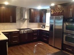 Matching Kitchen Cabinets With Dark Oak Hardwood Flooring Dark Oak Wood Floors Dark Oak Cabinets Oak Kitchen Cabinets