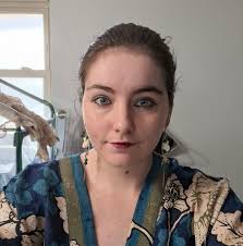 How to help a dog behind Planet Fitness in Hobbs, NM that won't come near?