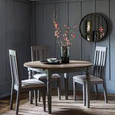 Where is the best place to buy dining chairs? Cookham Round Extending Dining Table Grey Extendable Dining Table Grey Dining Table
