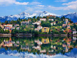 The lakeside promenade, where much of tourist life centers, offers beautiful views across to the islands. Lake Maggiore Stresa Isola Bella And Isola Dei Pescatori Day Trip From Milan Tours Activities Fun Things To Do In Milan Italy Veltra