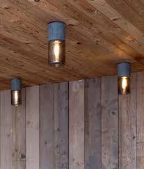 Sometimes called pot lighting, recessed fixtures are typically small and round. Natural Basalt Rock Carved To Form A Light Housing With Smoked Glass Shade