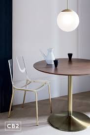 Odyssey Brass Wood Dining Table In 2020 Wood Dining Table Modern Dining Table Clear Chairs
