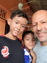 Two Macopa Trees, bearing red and pink bell- shaped fruits , will soon grow  and flourish