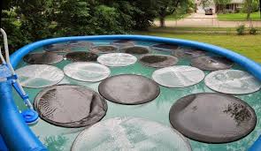 Beyond the initial kit purchase in short, solar heating for your swimming pool makes sense if you live in an area with a reasonable number of sunny days per year and if you plan. Pool Level Ground And Setup 2014 Homemade Pool Heater Homemade Swimming Pools Homemade Pools