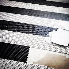 Bathroom tile choices for the flooring, we chose this beautiful penny tile with a flower pattern. Black And White Penny Tile Floor Novocom Top