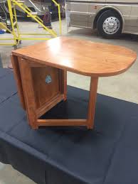 This is a sleek table that easily fits in small spaces but provides great functionality when the flaps are up or down. Folding Coffee Table Master Tech Rv