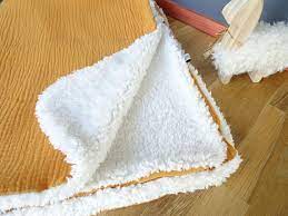 baby blanket in double gauze and sheepskin fur double gauze fur and shearling sheepskin
