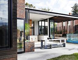 They can be installed in existing homes as purely decorative features and instantly add substance to an otherwise open room. Wood And Brick Walls Bring This Modern Interior To Life Home Stratosphere