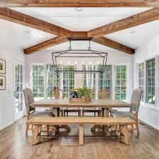 The belgian gray finish adds natural luster to the wood's texture, and the grain and hue. Linden Extending Dining Table Pottery Barn