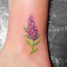 16 Mesmerizing Lilac Tattoo Designs To Celebrate Spring Tattoobloq Lilac Tattoo Purple Tattoos Tattoo Designs