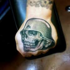 The configuration of the rifle pointed downward with a helmet perched. Top 91 Army Tattoos For Men Ideas 2021 Inspiration Guide