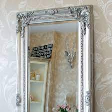Browse through beveled glass mirror with uniquely embellished frames and features to enhance your décor. Tall Silver Slim Mirror
