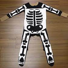 Easy Diy With White Spray Paint For All Ages Note To Self Get Long Black Gloves And Old Thrift Sto Skeleton Costume Diy Diy Halloween Costumes Halloween Diy