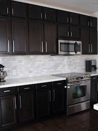The world of interior design became a better the marble counter connecting the bar and the sink area creates a welcoming and open kitchen space see the kitchen refacing project, dark wood cabinets to new white cabinets & quartz countertops! 40 Choosing Kitchen Remodel Dark Cabinets Backsplash Ideas 56 Apikhome Com