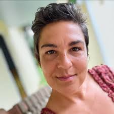 Can weed barrier fabric be used to control weeds when growing dahlias?