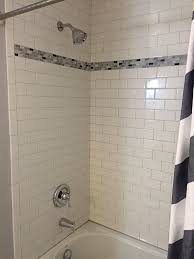 Subway 2x4 Tile Shower With Accent Strip Subway Tile Design White Subway Tile Bathroom Bathroom Design