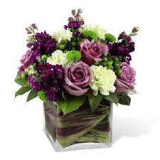 Flower vase, rectangle hammered crystal glass flower vase, flower arrangement vase with golden rim decor, modern square decorative centerpiece glass vase for home decor, 9.84'' h x 3.14'' d 4.5 out of 5 stars 34 The Beloved Bouquet Is A Compact Arrangement Of Green And Purple Flowers Designed In A Leaf Lined Square Beautiful Flowers Flower Arrangements Birthday Flowers