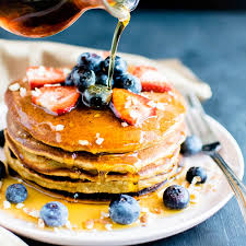 Maple Syrup Drizzling Over A Stack Of Chickpea Flour Peanut Butter Protein Panackes In 2020 Peanut Butter Protein Chickpea Flour Protein Pancakes
