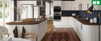A modern kitchen island in chrome or painted in a deeper or contrasting colour to the wall cabinets will make it a focal point in a grey kitchen. Copper Kitchens