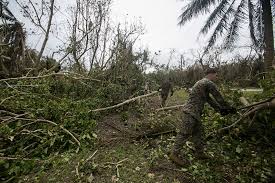 29 31st meu marines assist cleaning debris in rota after typhoon mangkhut  Images: NARA & DVIDS Public Domain Archive Public Domain Search