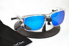 Maybe you would like to learn more about one of these? Oakley Holbrook Polished Clear Frame W Ice Blue Polarized Custom Lenses Oakley Oakley Sunglasses Mirrored Sunglasses