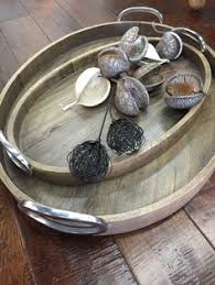 See more ideas about oval ottoman, ottoman, double beds. Oversize Ottomans And Coffee Tables Are Great And Versatile They Also Call For Accessories That Don T Look Dinky These Oval Wood Tray Wood Tray Ottoman Tray