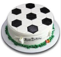 If your beloved one is a huge football fan, you can make a cake in the form of a football field with player figures, gates, and a ball. Football Theme Cake Half Kg Buy Football Theme Cake Online Warmoven