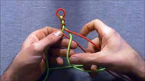 Put the top strand over the second strand and bring the second strand over the third strand. How To Tie A Four Strand Round Braid Paracord Survival Bracelet Video Dailymotion