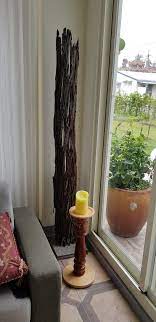 枯木逢春 爛得只剩下皮的筆筒樹 做了水泥基座 接上電源 成了摩登的立燈 house