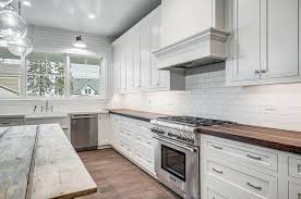 Complete the look with a backsplash that covers a portion of a wall or the entire wall between the countertops and kitchen cabinets. Kitchen Countertop Ideas With White Cabinets Designing Idea