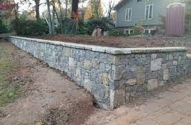 A half wall (also called a knee wall) is a great way to divide a space without closing it in. Retaining Walls Of Atlanta Sudlow Concrete