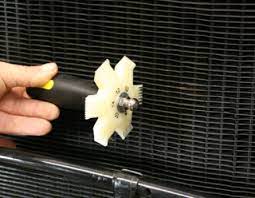 The inlet tube is slightly out of round. Using A Radiator Fin Comb To Fix Rock Damage