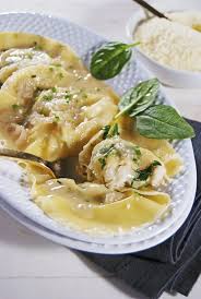 These Plump Ravioli Are Filled With Tasty Lobster And Mascarpone And Finished In A Delectable And Rich Champagne Beurre Blanc Sauc Lobster Ravioli Ravioli Food